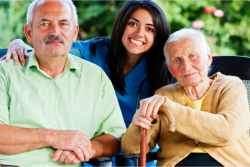 caregiver hugging elderly patients